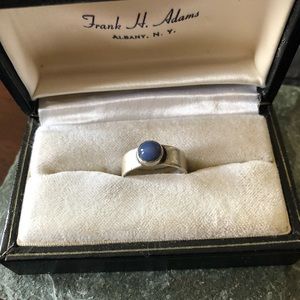 Signed rak sterling ring with blue stone